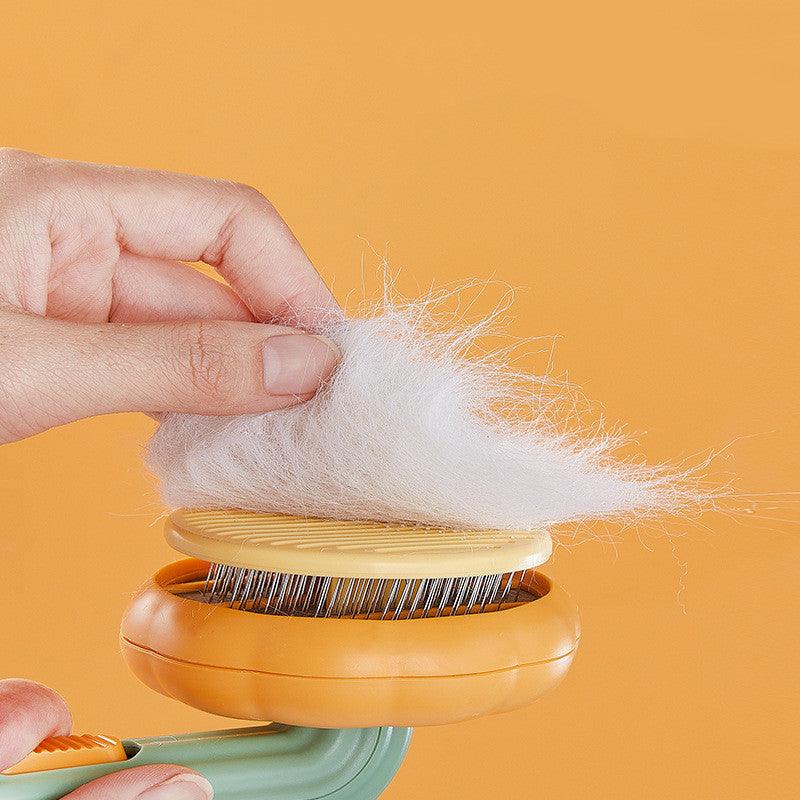 Cepillo autolimpiante para quitar el pelo de mascotas